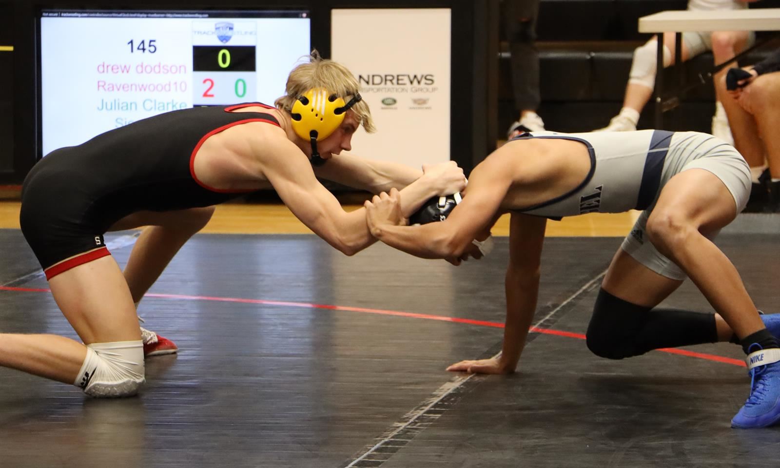 Two wrestlers compete 